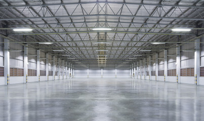 concrete floor inside industrial building. use as large factory, warehouse, storehouse, hangar or pl