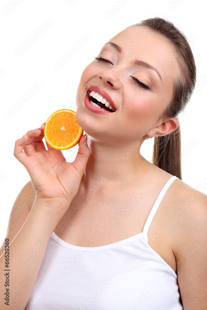 Beautiful girl with orange, isolated on white