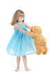 The girl whirls with teddybear