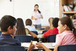 © Monkey Business - Schoolchildren passing note in class