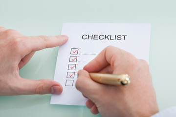 Wall Mural - Businessman Preparing Checklist