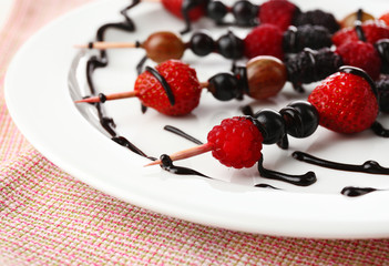 Sticker - Fresh fruit kebabs for healthy snack on plate