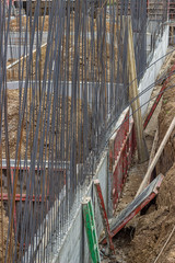 Reinforcing for concrete wall standing in a cement 2