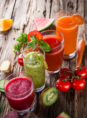 Wall Mural - Fresh juice, healthy drinks on wooden table.