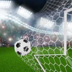 soccer ball in goal net