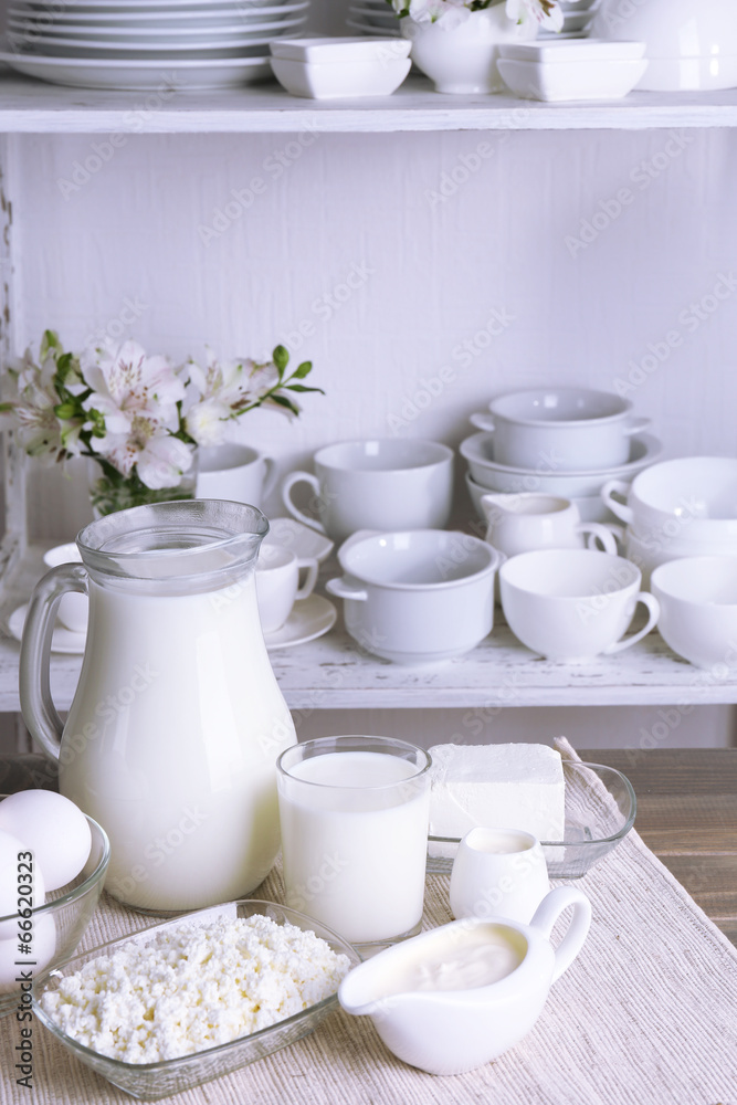 Still life with tasty dairy products on table