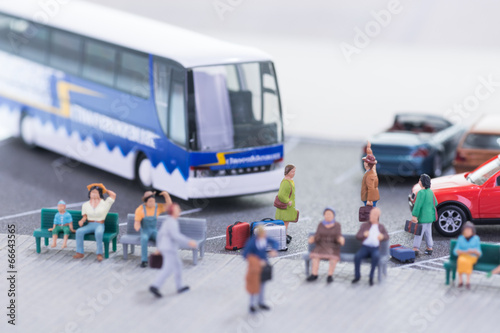 Fotografie, Obraz Miniature travellers at a busy bus station