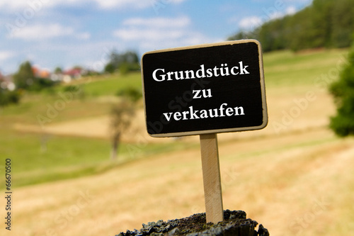 Grundstück zu verkaufen StockFoto Adobe Stock
