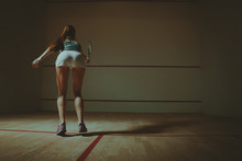 Woman Playing Squash