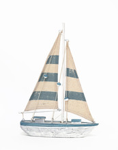 Wooden Toy Sailing Boat On White Background