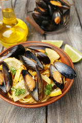 Sticker - Traditional noodles with mussels on table, close up