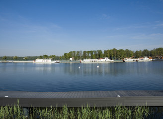 Poster - Empty wooden pier and ships