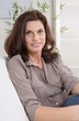 © Jeanette Dietl - Attractive middle aged woman in portrait.