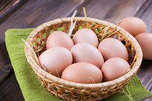 Chicken Eggs On Wooden Background