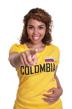 Pointing Young Woman From Colombia