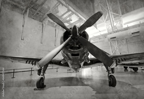 Obraz w ramie Old airplane in a hangar