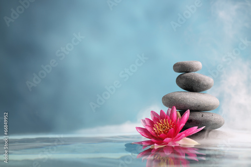 Obraz w ramie Stos kamieni z kwiatem lotosu - ZEN