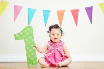 Canvas Print - Baby girl on her first birthday party