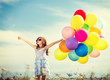 © Syda Productions - happy girl with colorful balloons