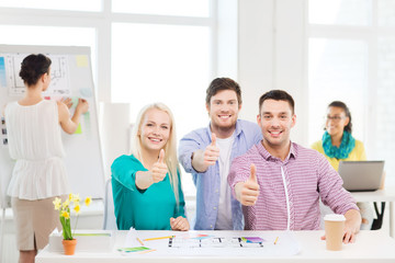 Poster - smiling interior designers working in office