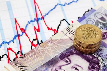 Business chart and money. Concept for finance, investment, inflation, interest rates and  cost of living crisis.