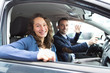 © Production Perig - Young business man couple in their brand new car