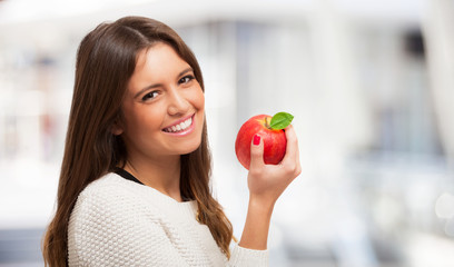 Woman holding an apple