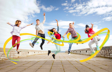 group of teenagers jumping