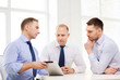 © Syda Productions - business team working with tablet pc in office