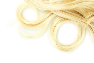 Wall Mural - Curly blond hair close-up isolated on white