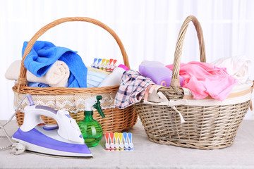 Wall Mural - Colorful towels and clothes in baskets