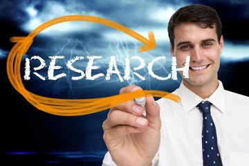 Poster - Businessman writing the word research