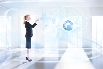 Poster - Composite image of businesswoman pointing somewher