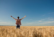 © Nataliya Dvukhimenna - young man in the wheat field