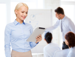 Sticker - smiling woman looking at tablet pc computer