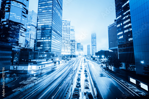traffic with blur light through city at night Poster