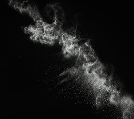 Wall Mural - white powder exploding isolated on black