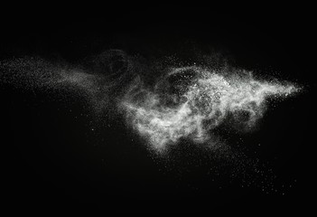 Wall Mural - white powder exploding isolated on black