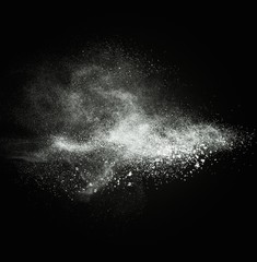 Wall Mural - white powder exploding isolated on black