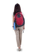 © Creativa Images - Rearview student walking on white background