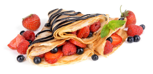 Delicious pancakes with berries isolated on white