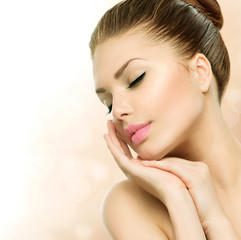 Wall Mural - beauty spa woman portrait. beautiful girl touching her face