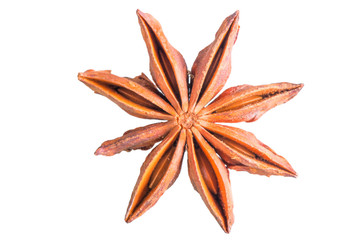 Dried anise spice on white background macro