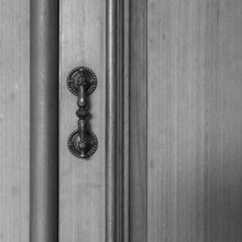 Ancient Manor Door Handle On Old Wood Door