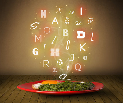 Fresh cook food with colorful letters on wood