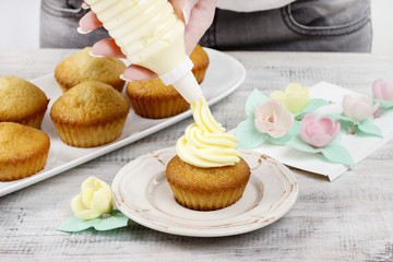 Wall Mural - Woman making cupcakes