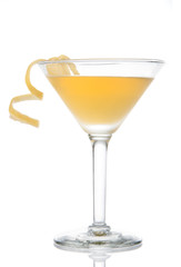 Wall Mural - Yellow banana cocktail in martini glass with lemon twist