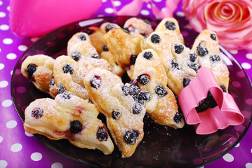 Wall Mural - puff pastry cookies with blueberry in butterfly shape