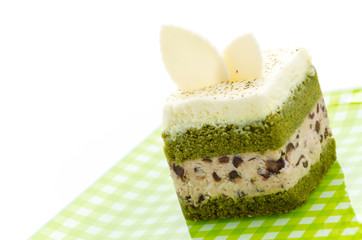 Canvas Print - Matcha green tea cake isolated on white background