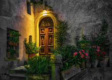 Door In An Old House Decorated With Flower At Night